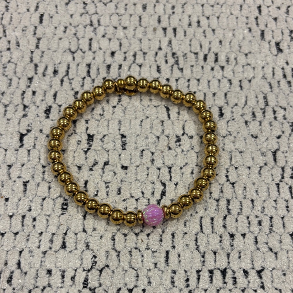 Gold Beaded Stretch Bracelet with Pink Accent Bead